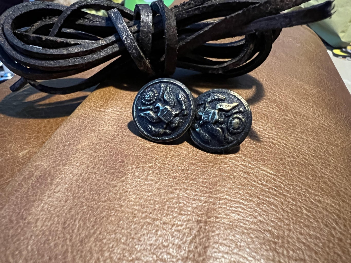 Buttons and Leather Cord.